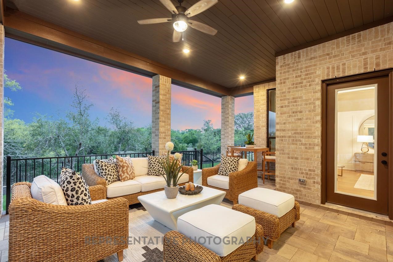 207 Wooded Rill Court Willis, TX 77318 - Photo 18 of 28 a outdoor living space with patio furniture and a potted plant