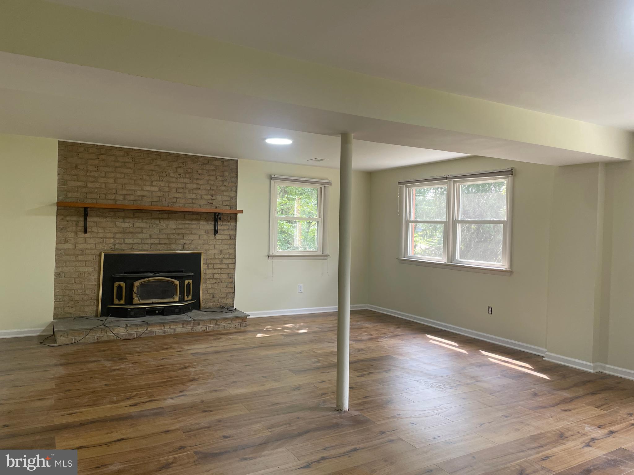 13409 Doncaster Lane Silver Spring, MD 20904 - Photo 25 of 37 a view of a livingroom with a fireplace and window