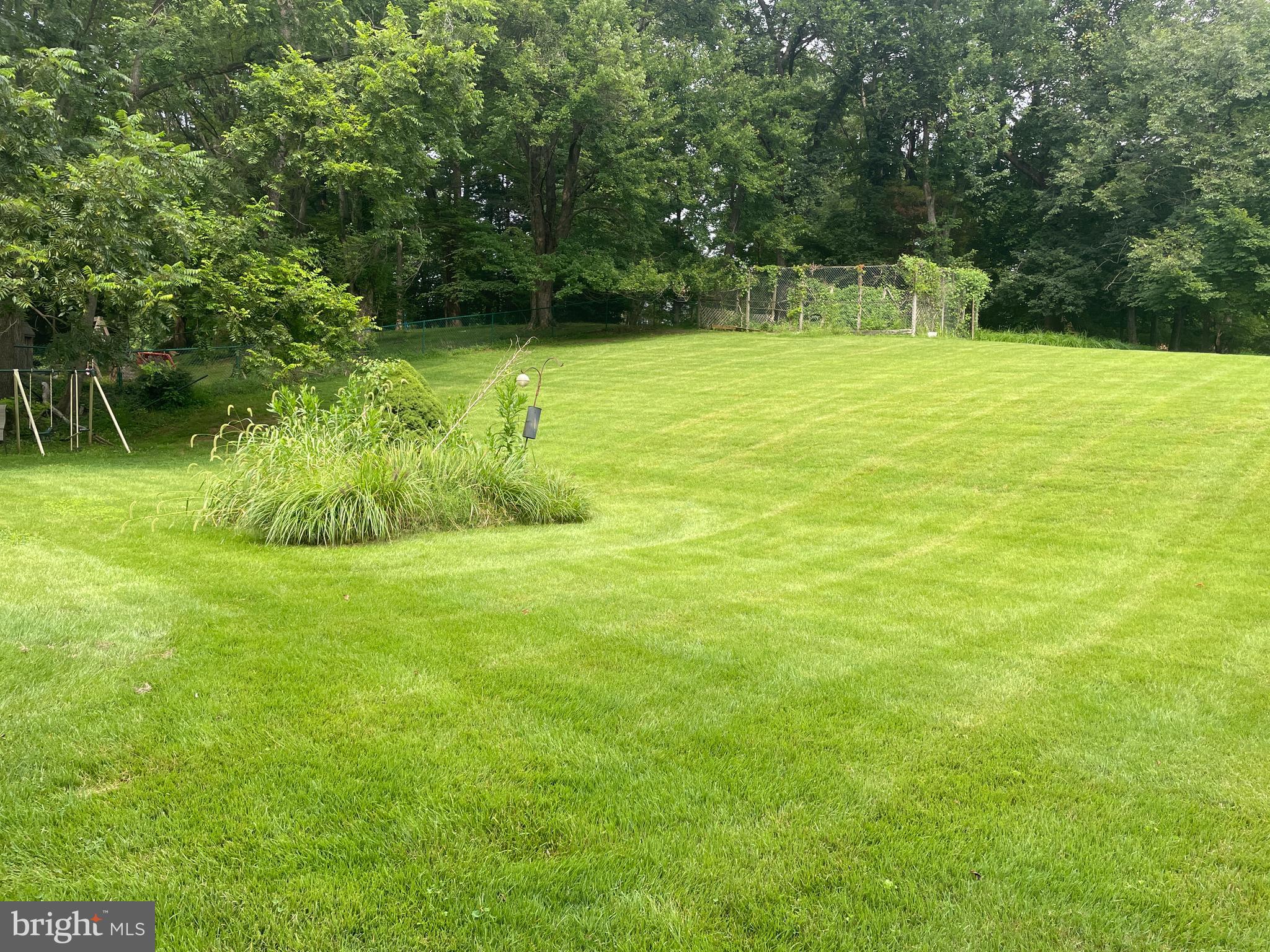 13409 Doncaster Lane Silver Spring, MD 20904 - Photo 35 of 37 a view of a swimming pool with a yard