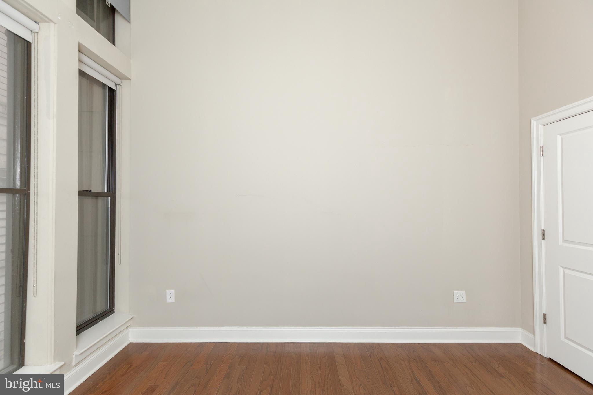 1411-2 Walnut Street, Unit 312 Philadelphia, PA 19102 - Photo 12 of 23 a view of small space with wooden floor