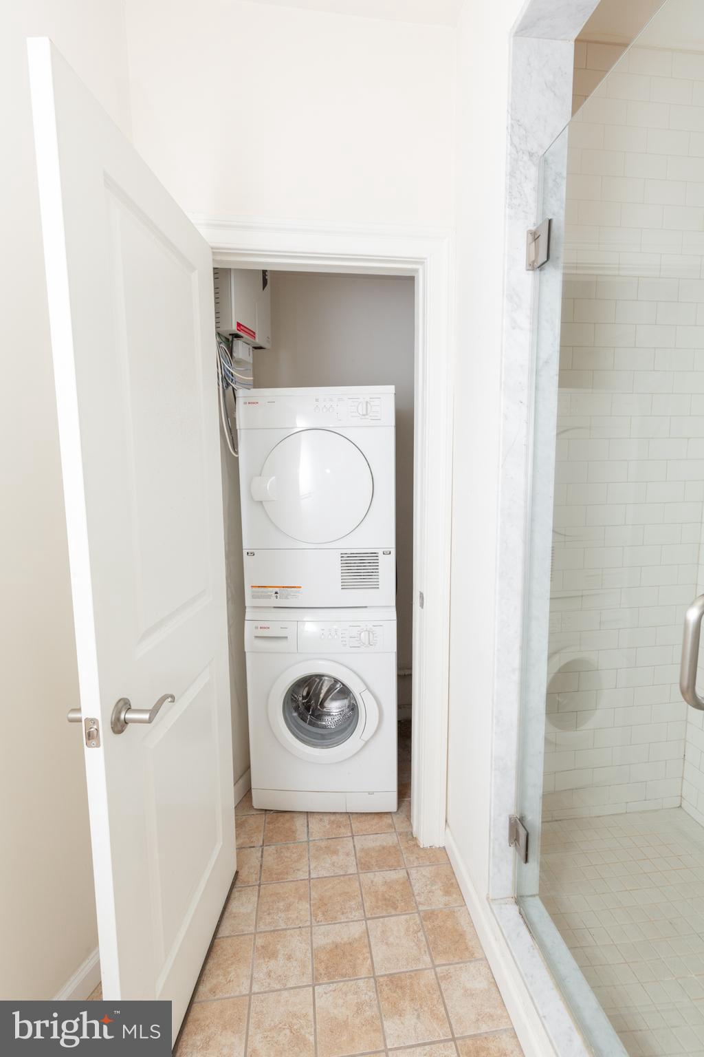 1411-2 Walnut Street, Unit 312 Philadelphia, PA 19102 - Photo 22 of 23 a bathroom with a sink and a shower