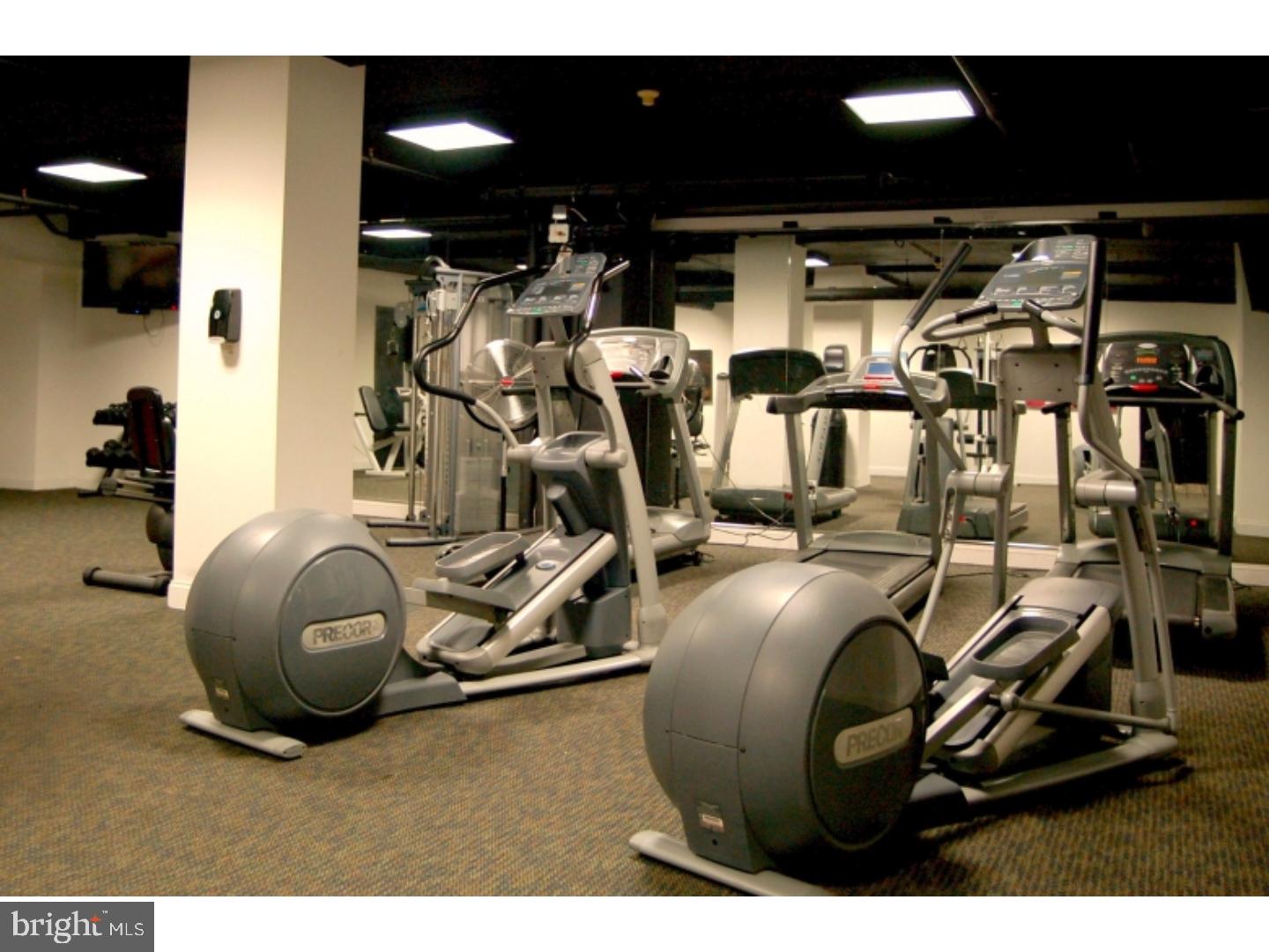 1411-2 Walnut Street, Unit 312 Philadelphia, PA 19102 - Photo 4 of 23 a room with gym equipment