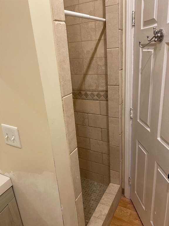 96 Marcella Street, Unit 2 Boston, MA 02119 - Photo 14 of 37 a bathroom with a shower
