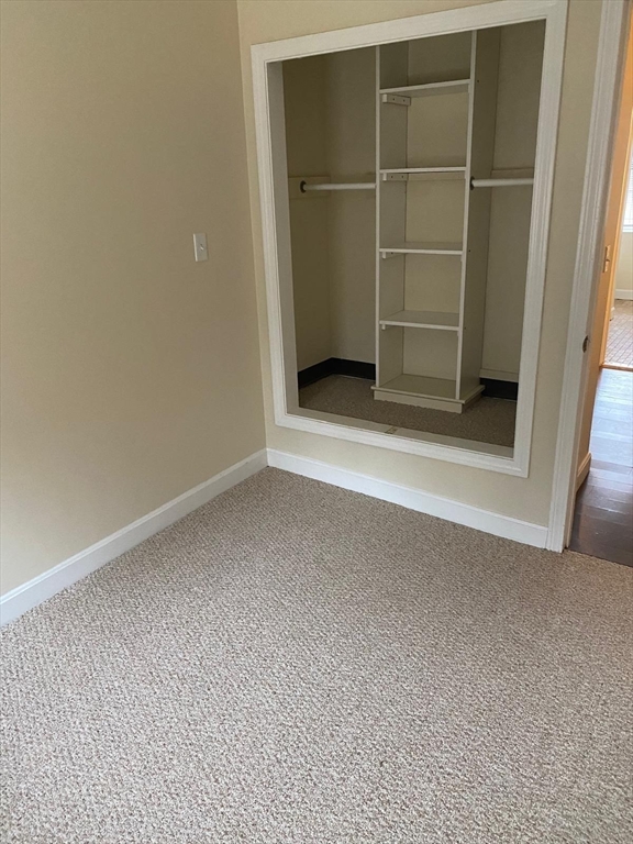 96 Marcella Street, Unit 2 Boston, MA 02119 - Photo 25 of 37 a view of an empty room with a door