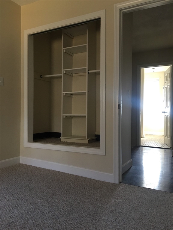 96 Marcella Street, Unit 2 Boston, MA 02119 - Photo 26 of 37 a view of an empty room with a window