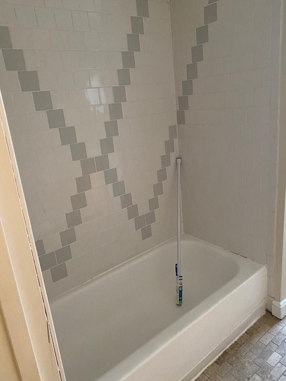 96 Marcella Street, Unit 2 Boston, MA 02119 - Photo 30 of 37 a close view of a bathtub in bathroom