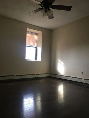 a view of a small space with racks on the wall