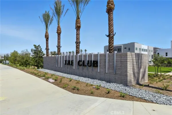 a view of a pathway with a building in the background