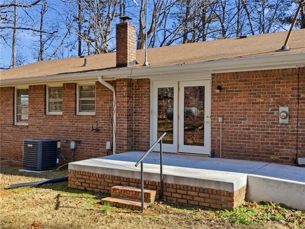 a front view of a house with parking