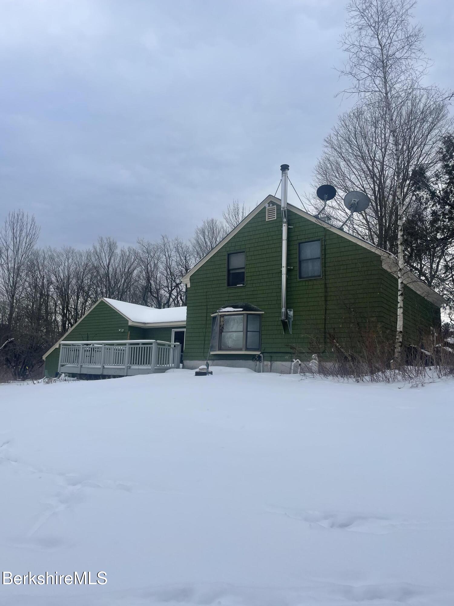14 Blotz Road Washington, MA 01223 - Photo 18 of 28 a view of a small house in middle of the forest
