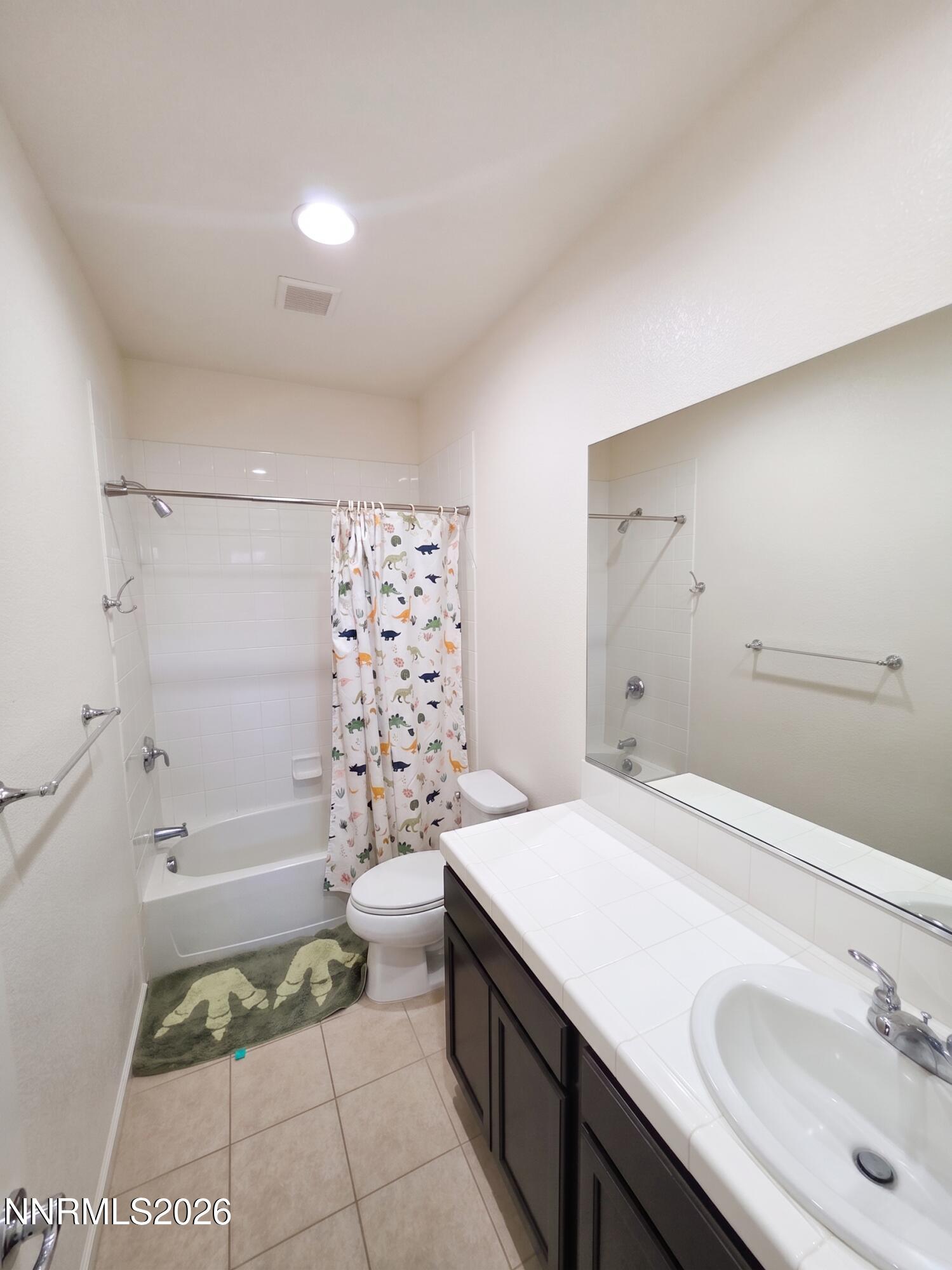 2775 Bonfire Lane Reno, NV 89521 - Photo 29 of 41 a bathroom with a sink a toilet and shower