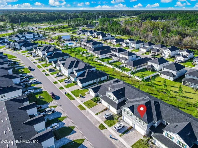 a backyard of a house with lots of green space