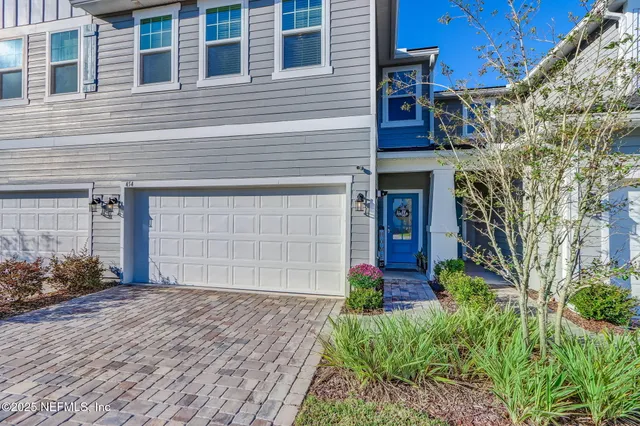a kitchen with cabinets and appliances