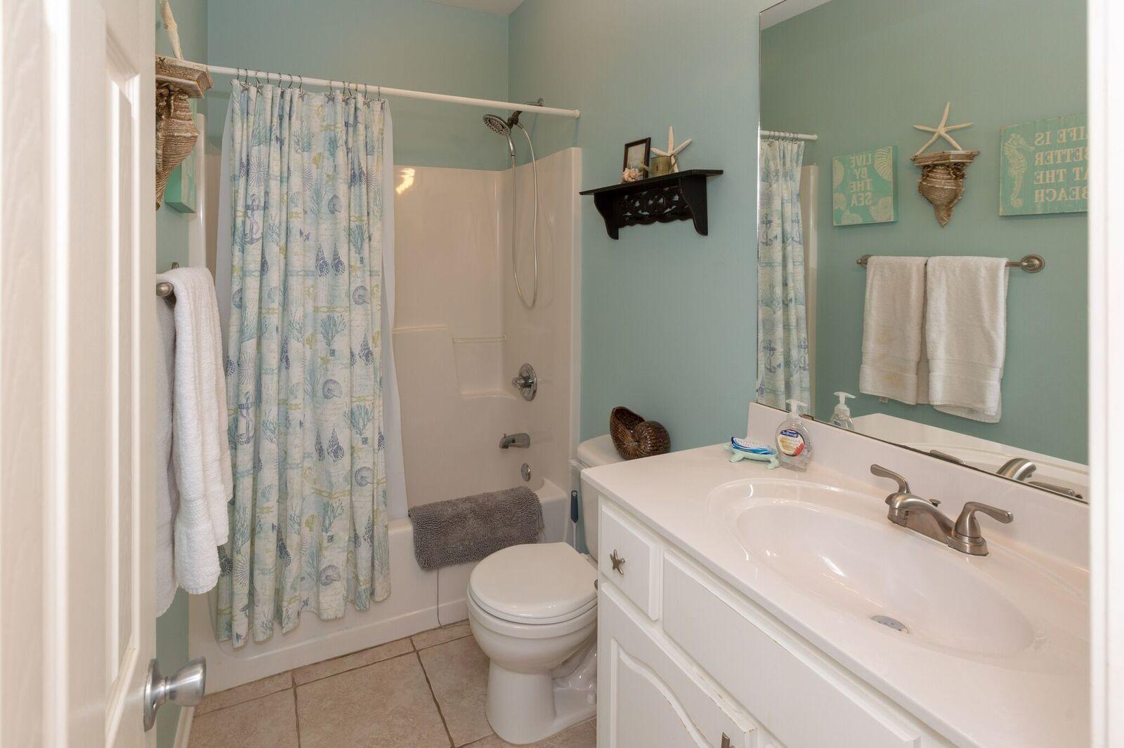 474 Hidden Lake Way Santa Rosa Beach, FL 32459 - Photo 12 of 34 a bathroom with a sink toilet and shower