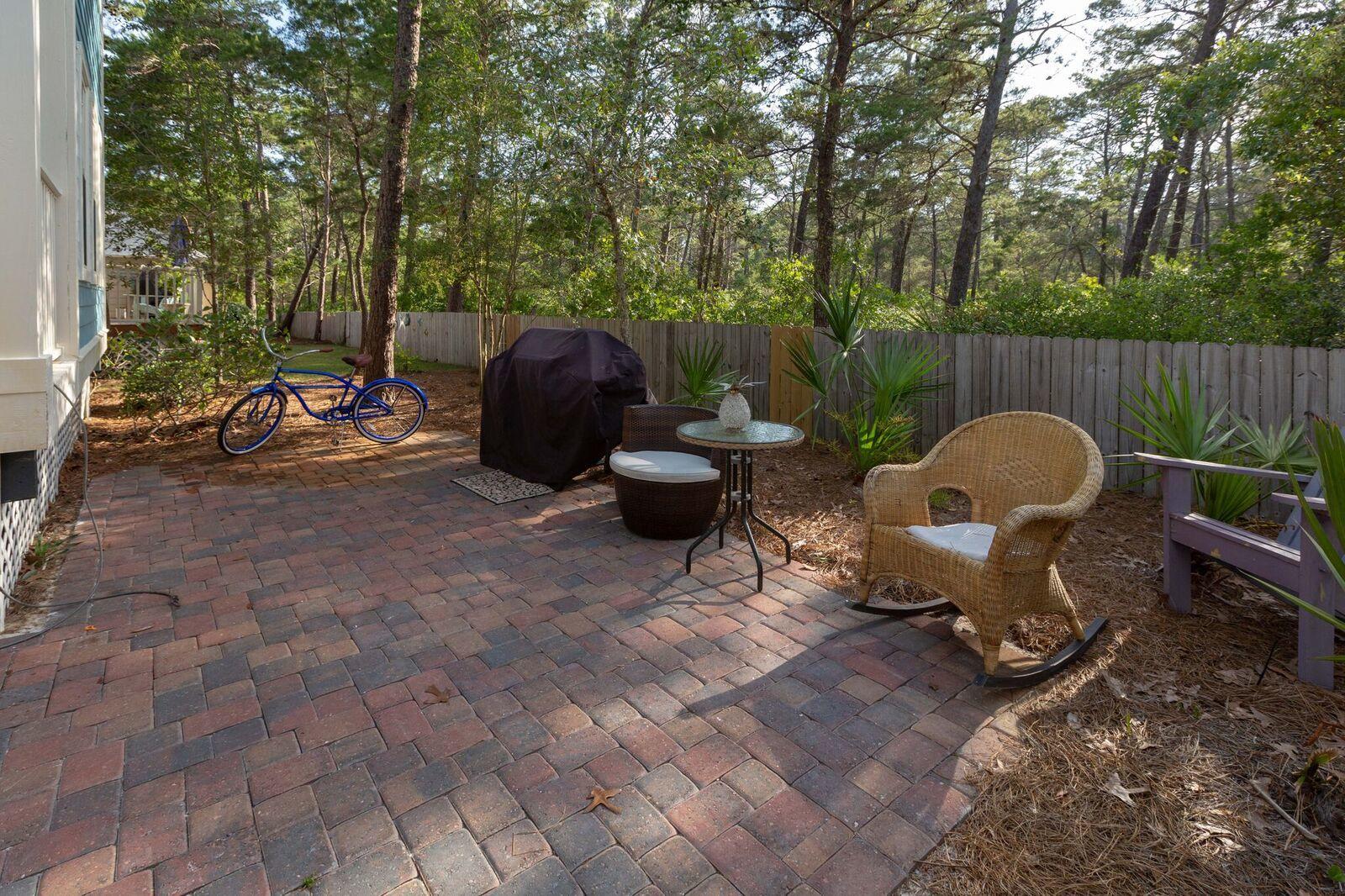 474 Hidden Lake Way Santa Rosa Beach, FL 32459 - Photo 28 of 34 a view of a backyard with furniture and a tub
