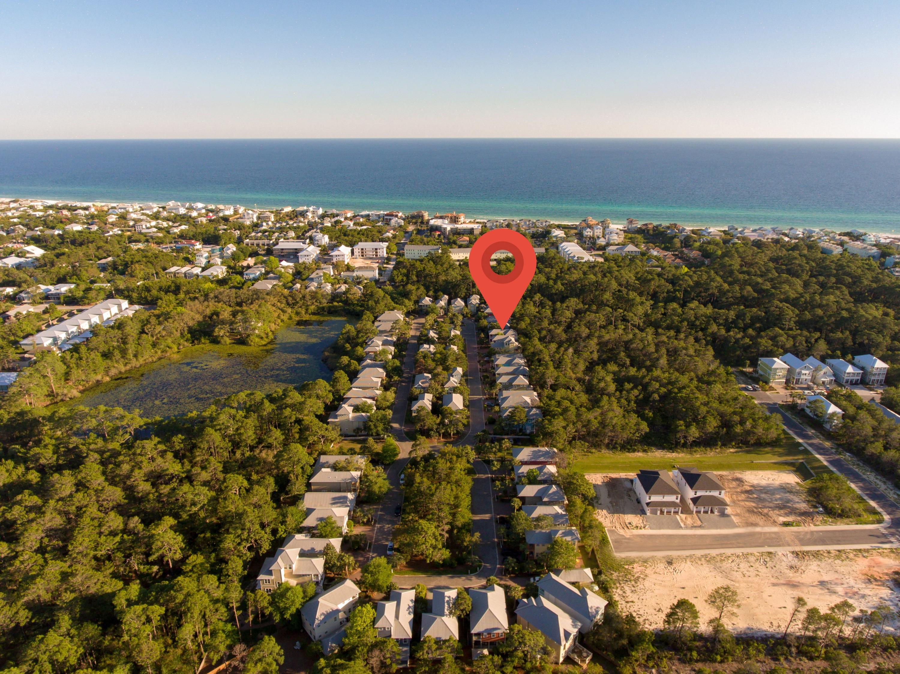 474 Hidden Lake Way Santa Rosa Beach, FL 32459 - Photo 29 of 34 an aerial view of residential houses with outdoor space