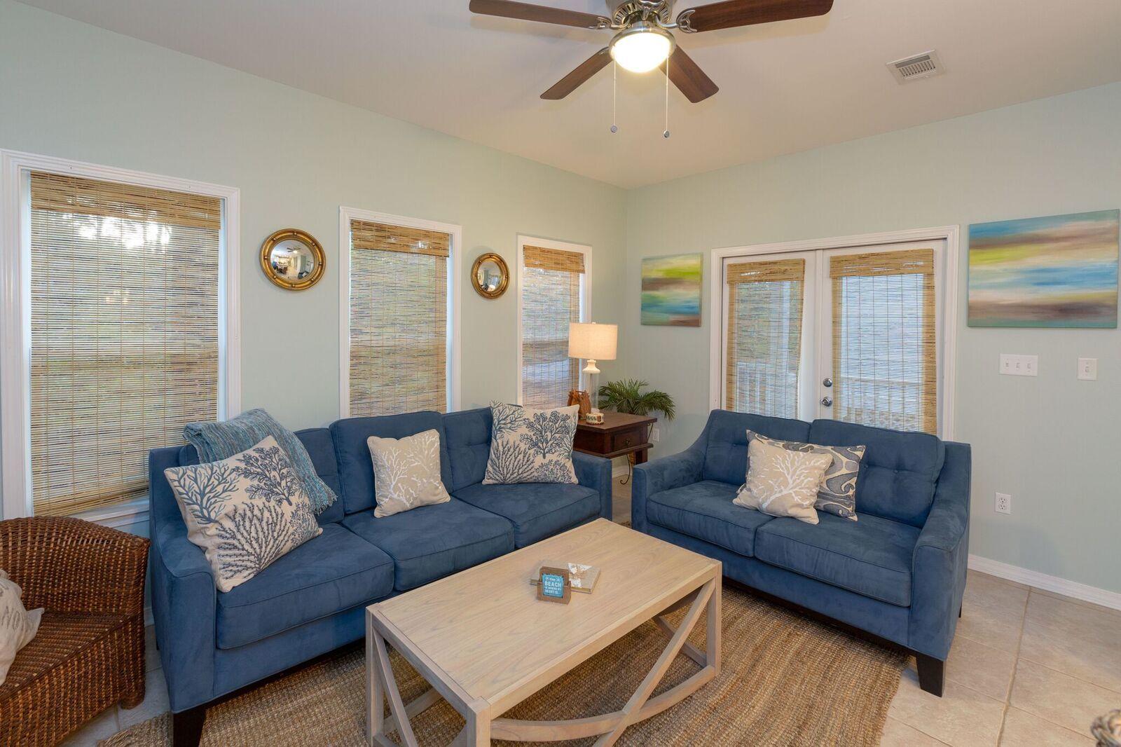 474 Hidden Lake Way Santa Rosa Beach, FL 32459 - Photo 4 of 34 a living room with furniture and a large window