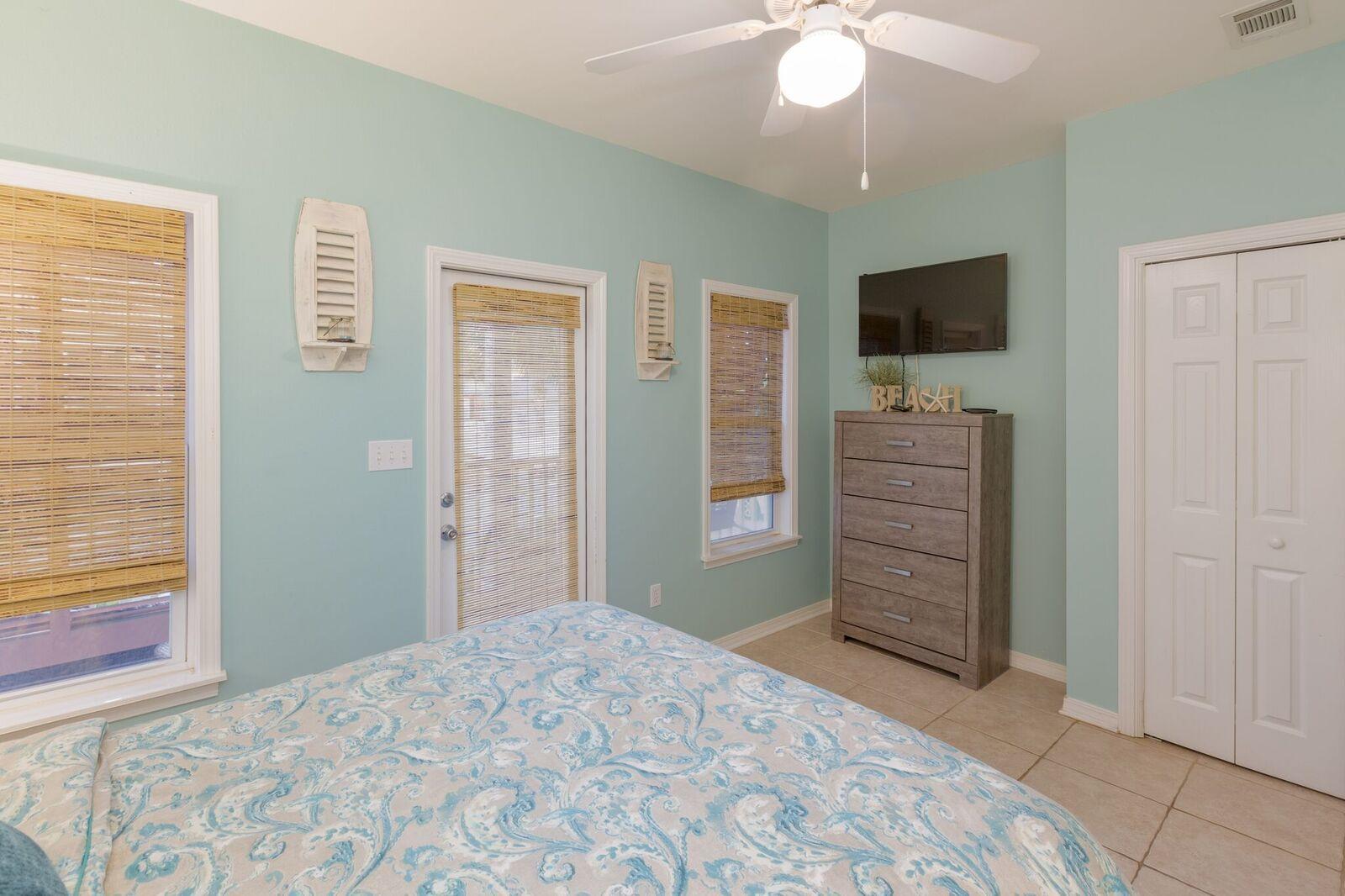 474 Hidden Lake Way Santa Rosa Beach, FL 32459 - Photo 10 of 34 a bedroom with a bed and a flat screen tv