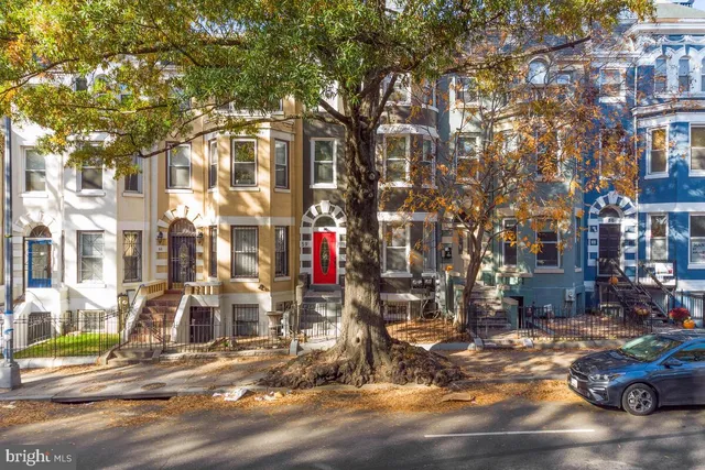 a picture of a bathroom with a toilet