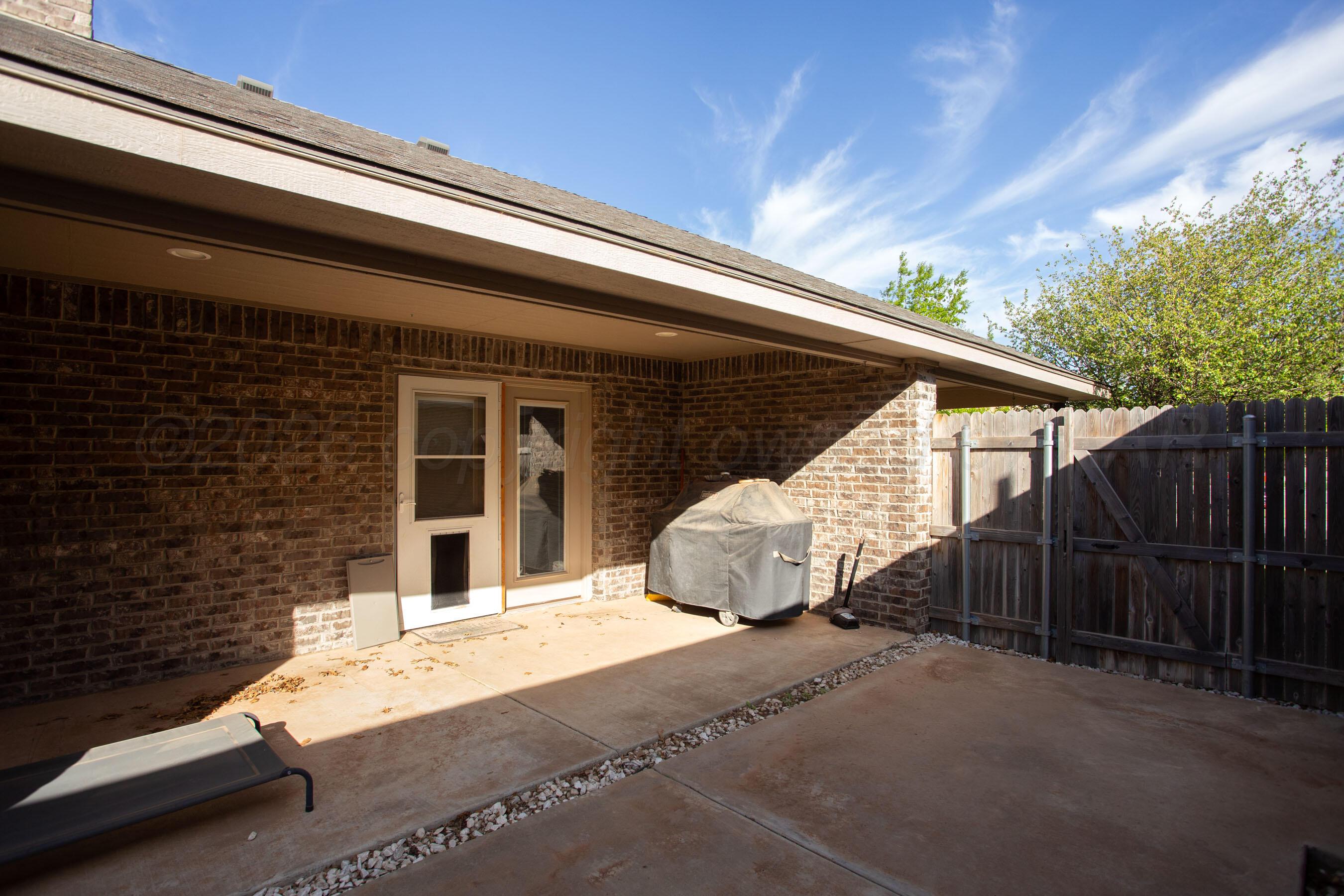 9505 Perry Avenue Amarillo, TX 79119 - Photo 19 of 21 a view of a house with a patio