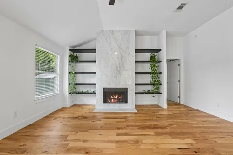 a view of livingroom with furniture and window