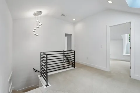 a view of a room with stairs and a couch