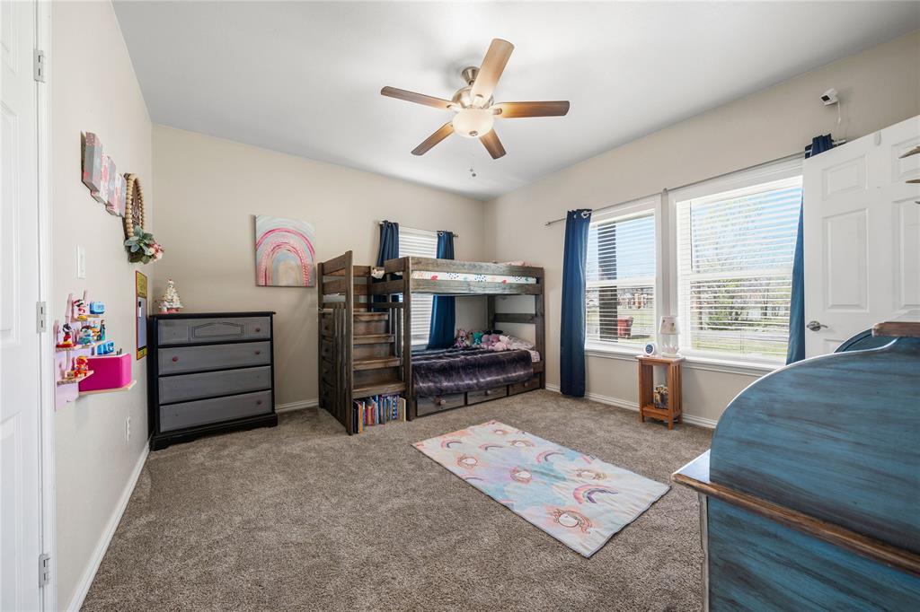 105 South 6th Street Celeste, TX 75423 - Photo 16 of 34 a living room with furniture and a fireplace