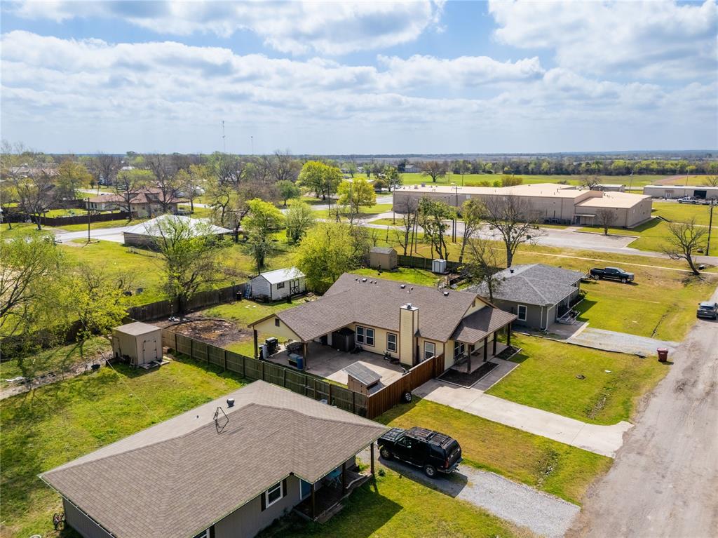 105 South 6th Street Celeste, TX 75423 - Photo 28 of 34 an aerial view of a house with a ocean view