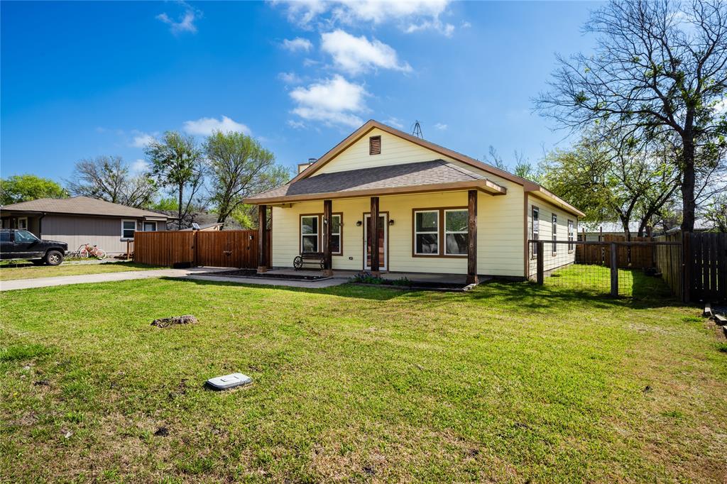 105 South 6th Street Celeste, TX 75423 - Photo 30 of 34 a front view of a house with a yard