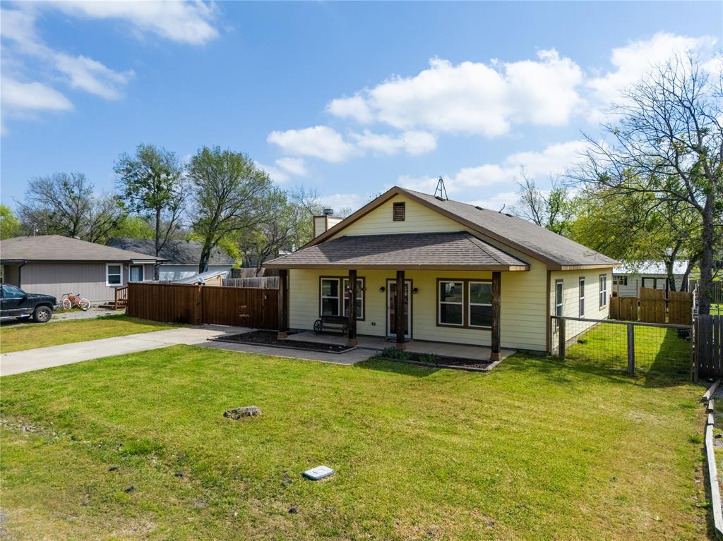 105 South 6th Street Celeste, TX 75423 - Photo 34 of 34 a view of a house with a yard and sitting area