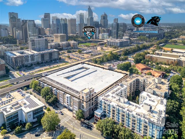 a view of a city with tall buildings