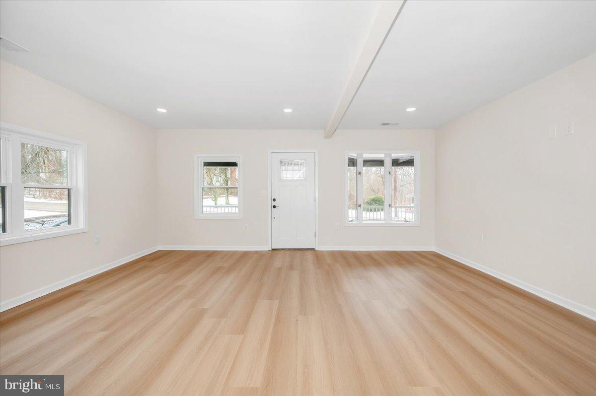 9932 Kelly Road Frederick, MD 21701 - Photo 17 of 74 wooden floor in an empty room with a window