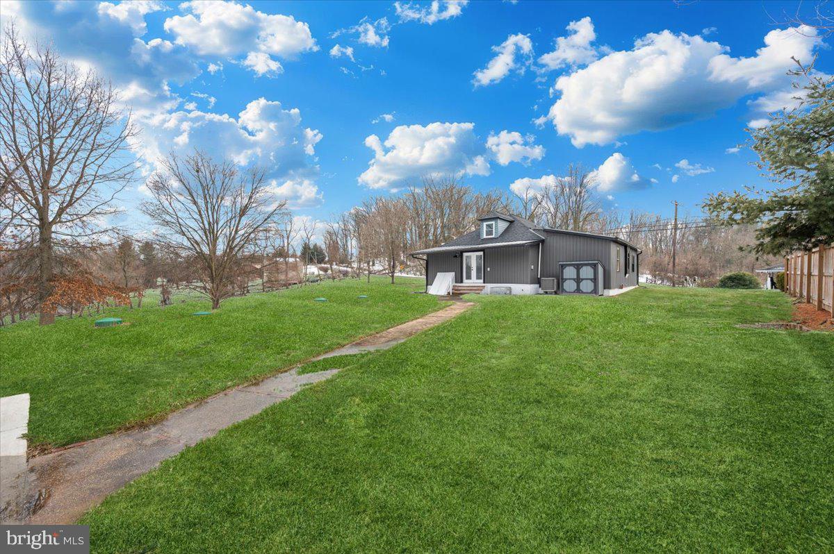 9932 Kelly Road Frederick, MD 21701 - Photo 71 of 74 a view of a house with a yard