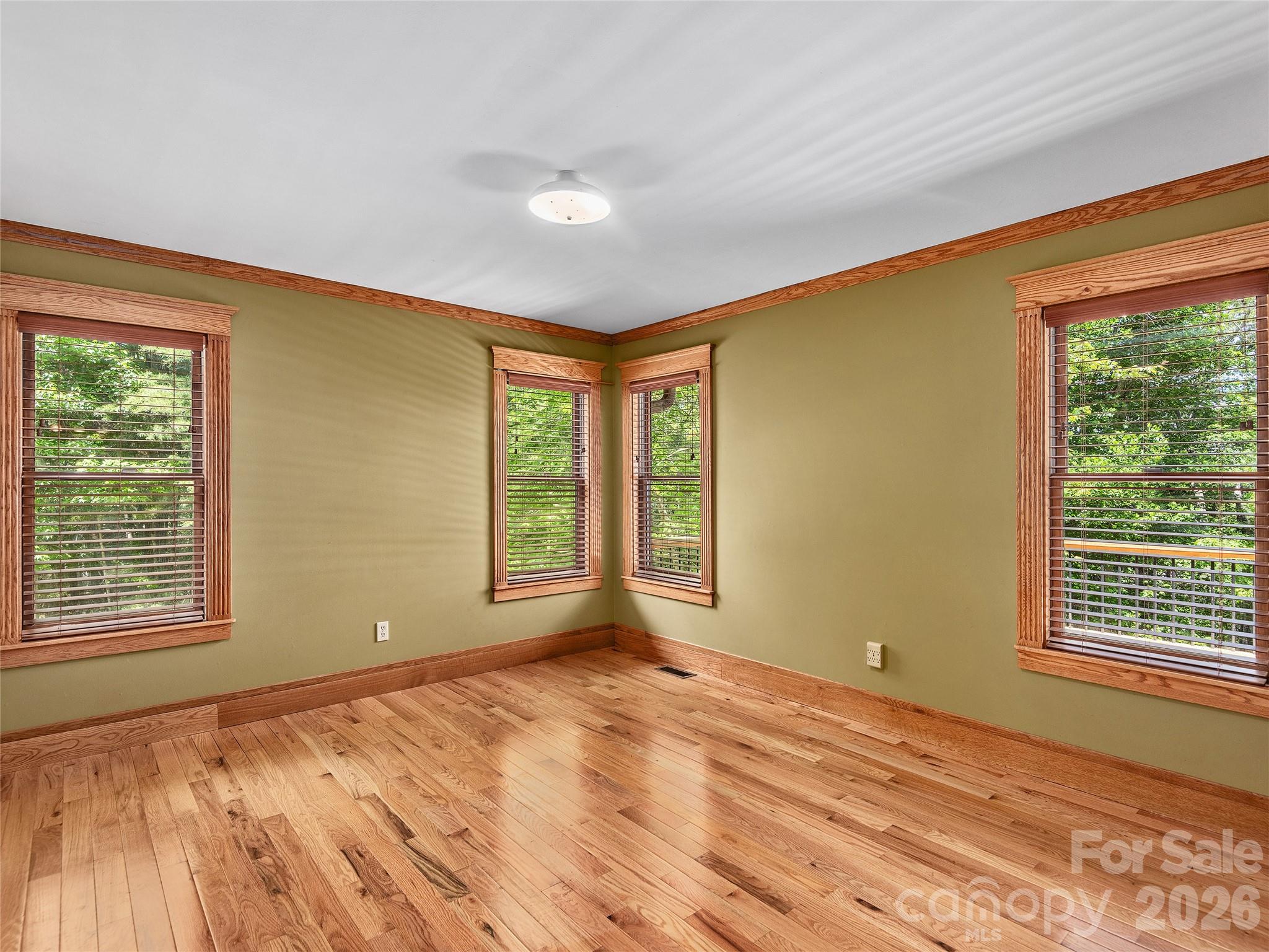 40 Deer Ridge Road Mills River, NC 28759 - Photo 26 of 35 a view of an empty room with a window