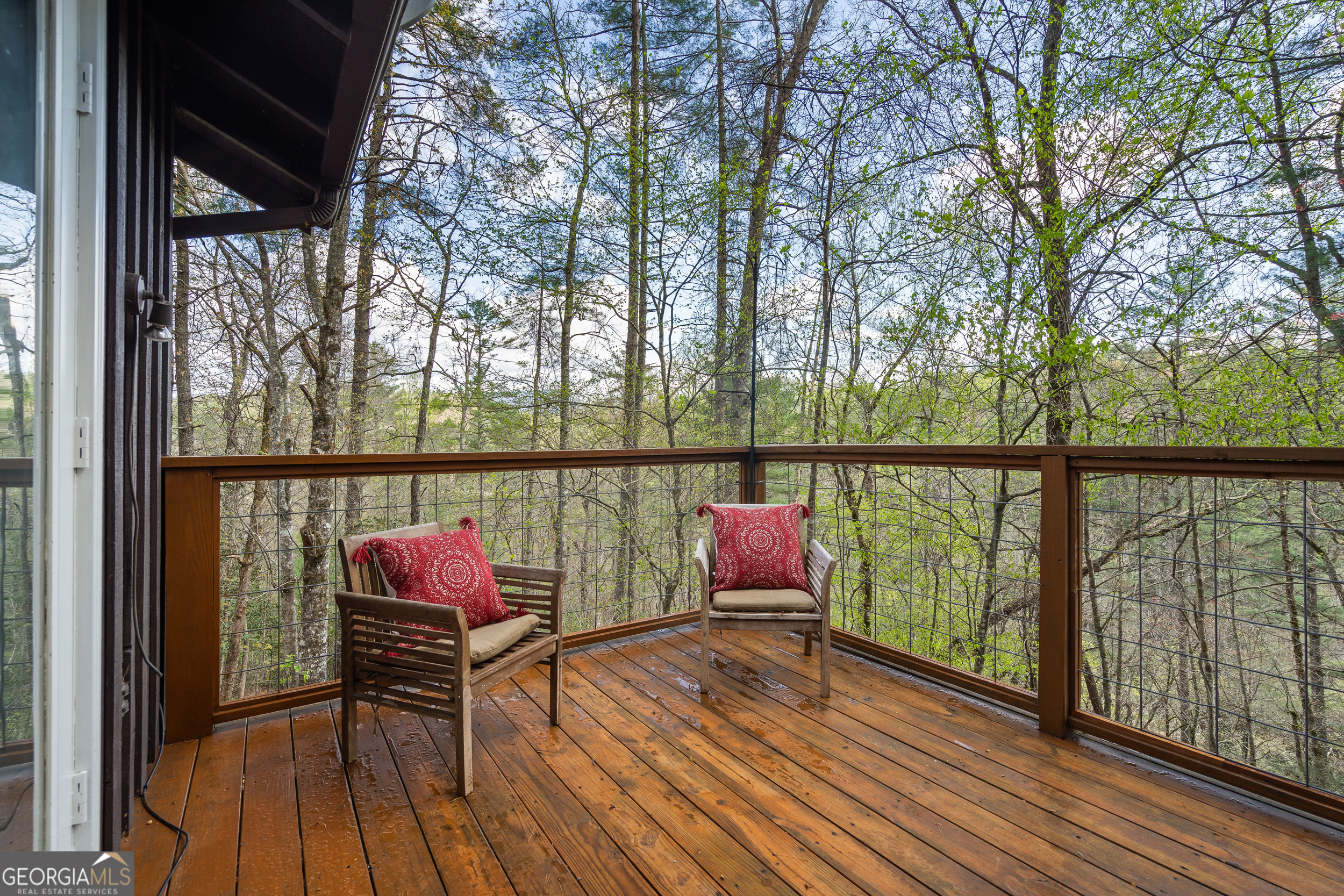 426 Crow Creek Road Lakemont, GA 30552 - Photo 18 of 60 a sitting on deck with hardwood