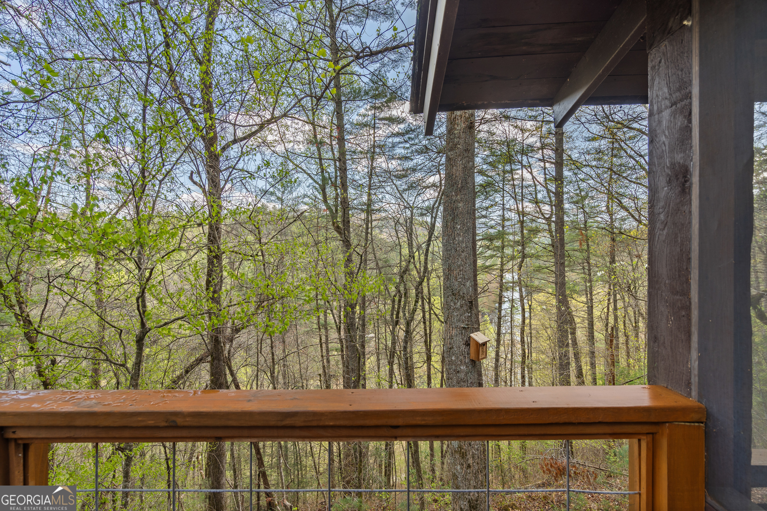 426 Crow Creek Road Lakemont, GA 30552 - Photo 19 of 60 a view of a balcony with an outdoor space