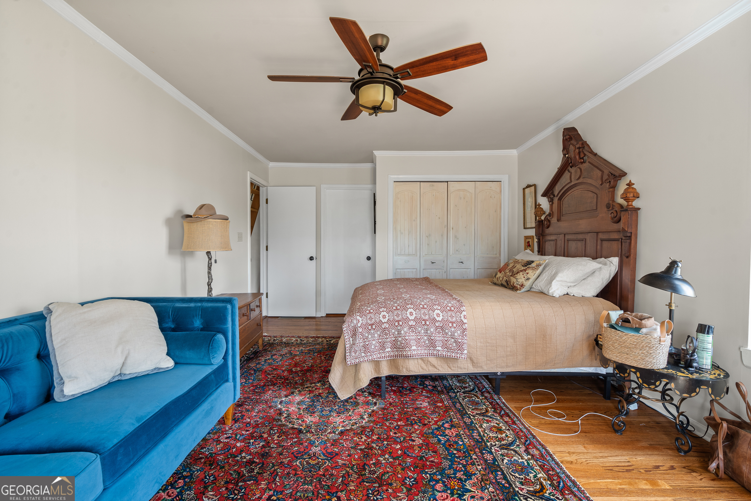 426 Crow Creek Road Lakemont, GA 30552 - Photo 22 of 60 a bed room with a bed and a couch