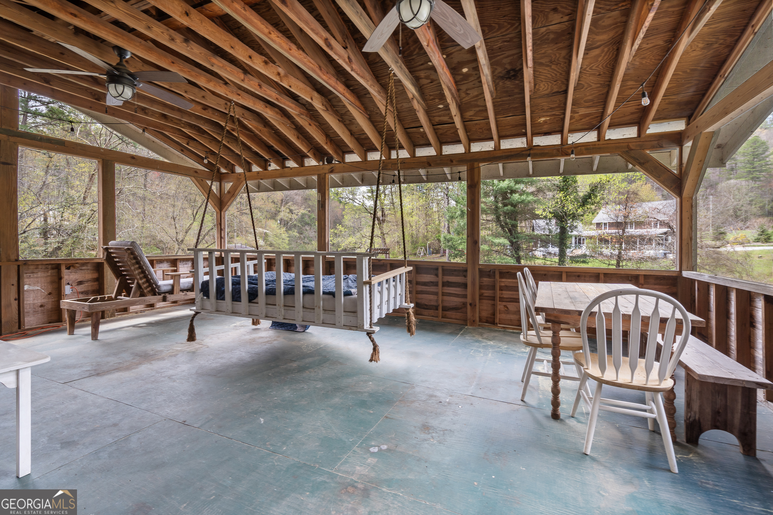 426 Crow Creek Road Lakemont, GA 30552 - Photo 43 of 60 a view of a chairs and table in the room