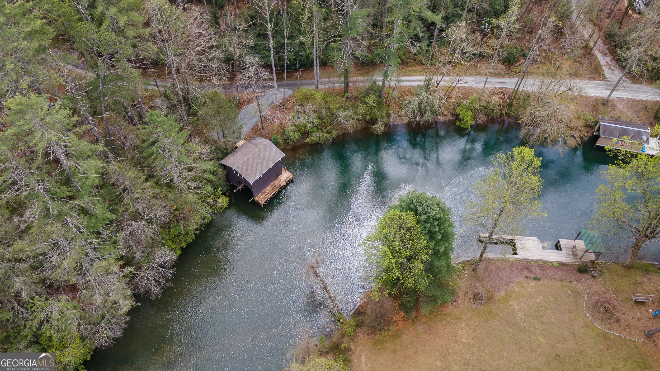 426 Crow Creek Road Lakemont, GA 30552 - Photo 56 of 60 an aerial view of a house with a yard
