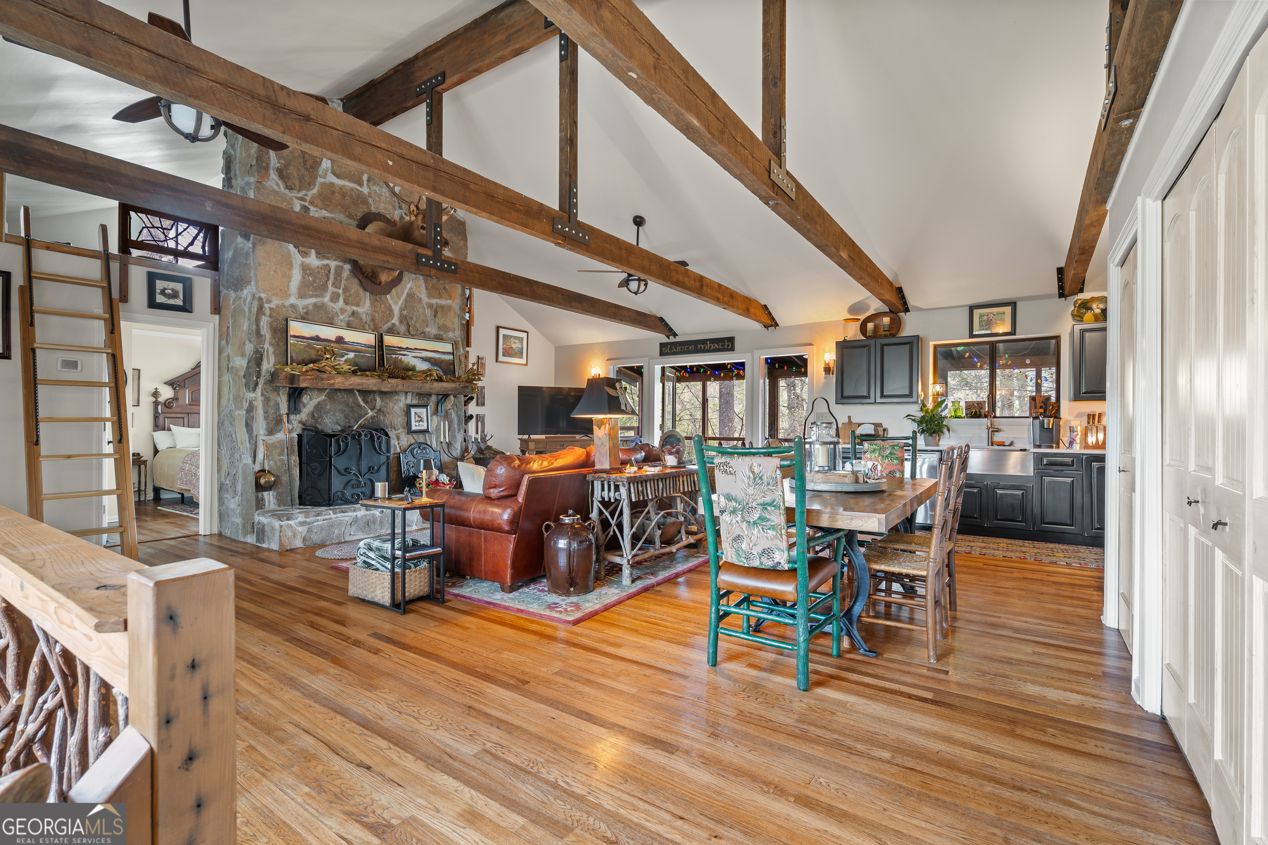 426 Crow Creek Road Lakemont, GA 30552 - Photo 9 of 60 a dining room with furniture and wooden floor