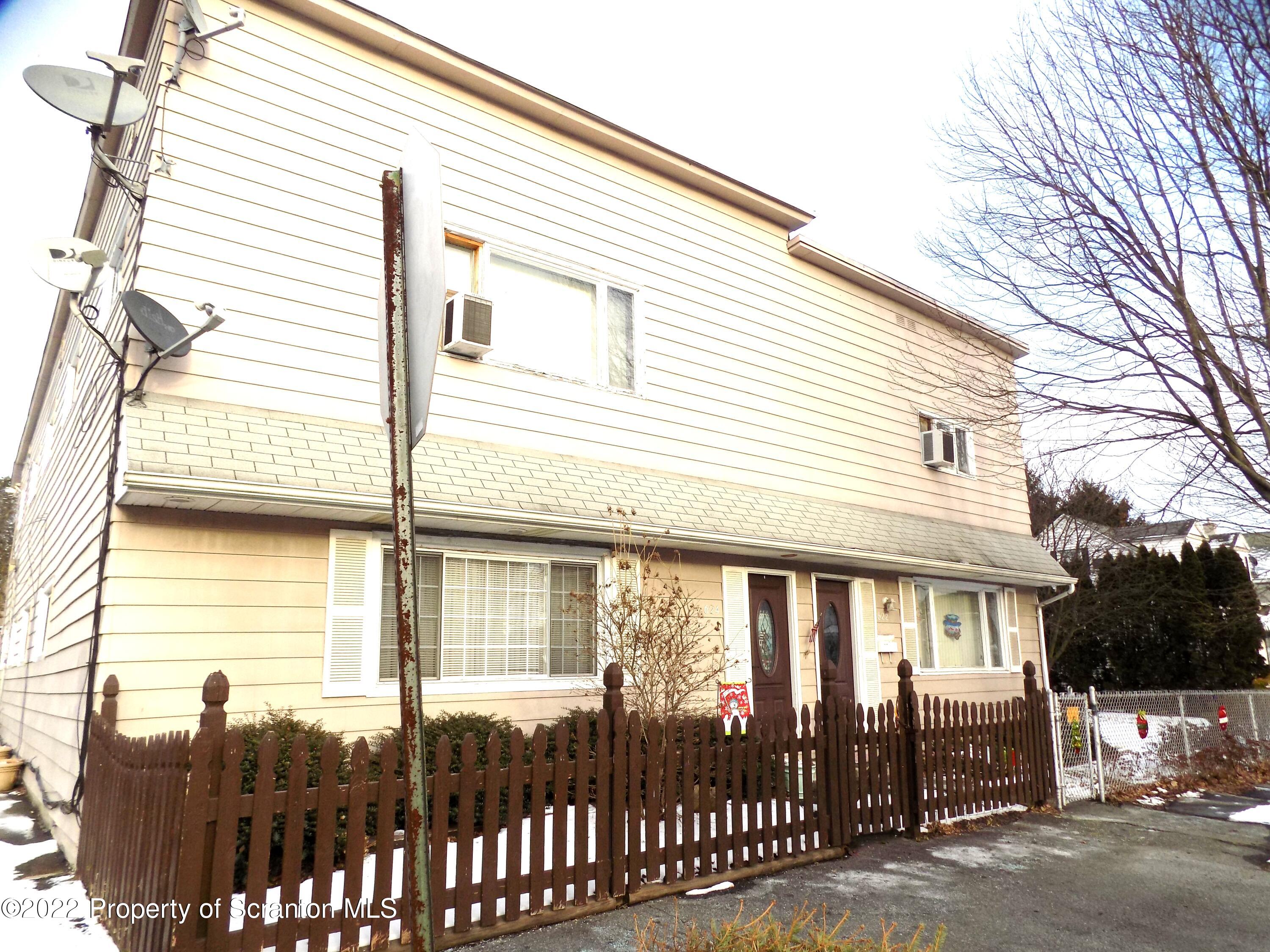 a view of a house with a balcony
