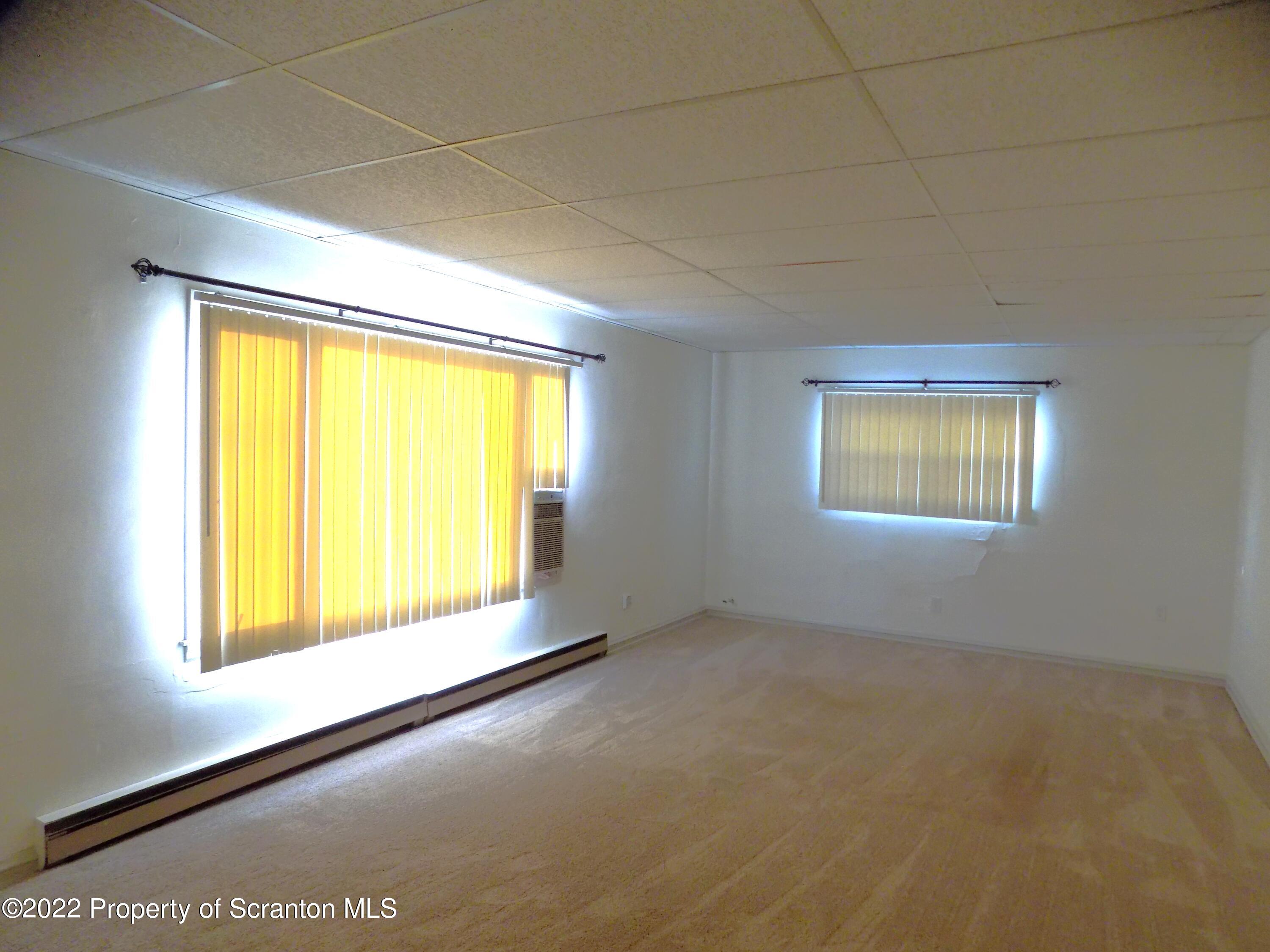 624 Court Street Scranton, PA 18508 - Photo 11 of 13 a view of an empty room with a window