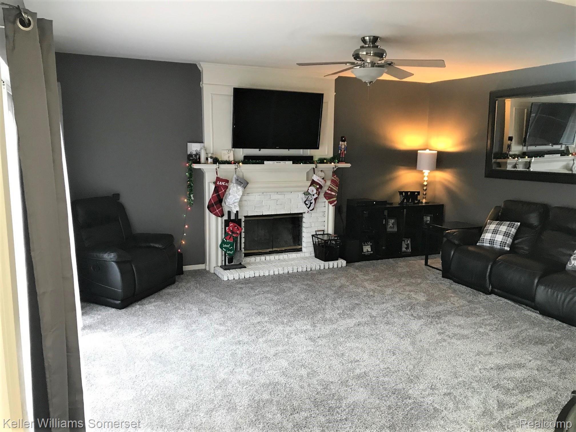 222 Saxon Court Rochester, MI 48307 - Photo 12 of 24 Living Room with Natural Fireplace