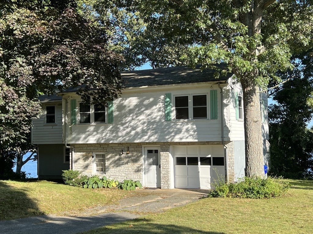 12 Nye Lane Bourne, MA 02532 - Photo 2 of 38 a front view of house with yard