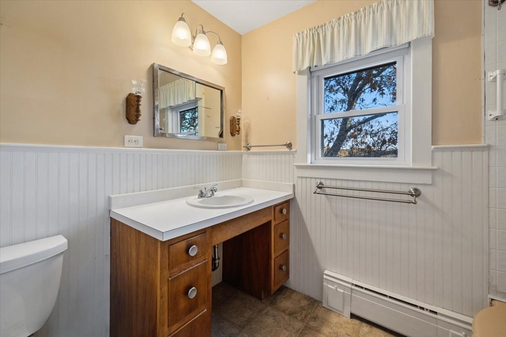 12 Nye Lane Bourne, MA 02532 - Photo 28 of 38 a bathroom with a sink a vanity and a toilet
