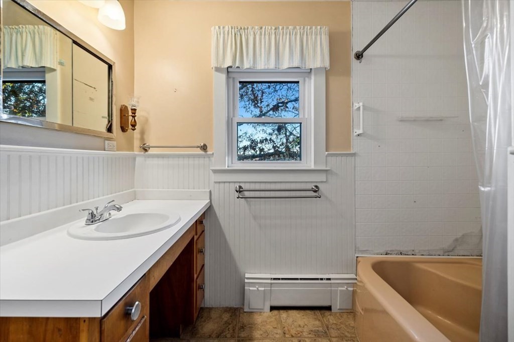 12 Nye Lane Bourne, MA 02532 - Photo 29 of 38 a bathroom with a sink a toilet and a bathtub