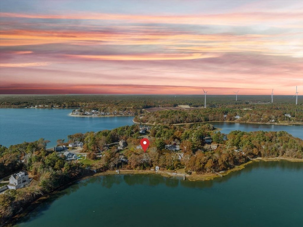 12 Nye Lane Bourne, MA 02532 - Photo 5 of 38 a view of a lake with a city