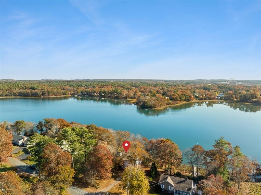 12 Nye Lane Bourne, MA 02532 - Photo 6 of 38 an aerial view of lake and residential houses with outdoor space