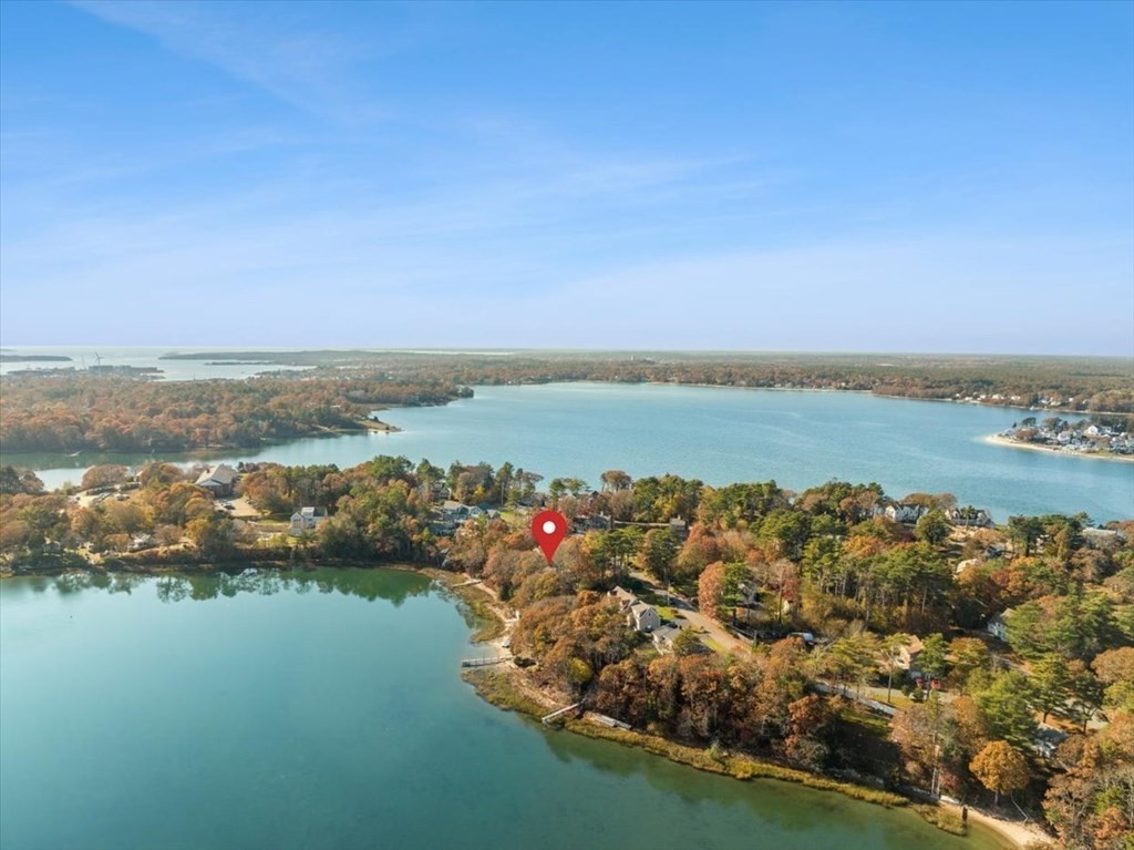 12 Nye Lane Bourne, MA 02532 - Photo 8 of 38 an aerial view of ocean and residential houses with outdoor space