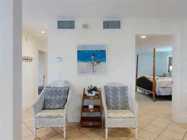 a bedroom with furniture and a couch